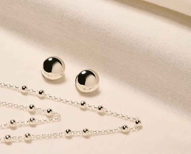 Lunar Silver Huggie Earrings