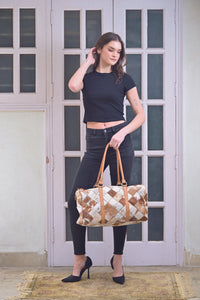 Tan and White Patchwork Cowhide Travel Bag